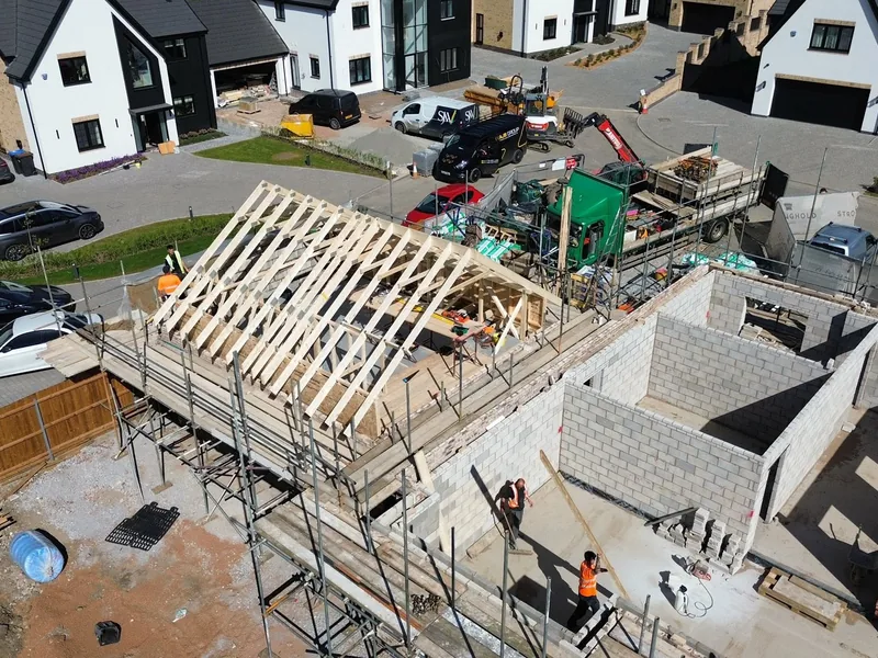 Attic trussed roof being fitted by AJB Group carpenters to create a room in the roof