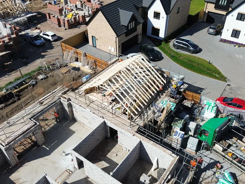 Attic trussed hip roof taking shape on a Cambridgeshire development