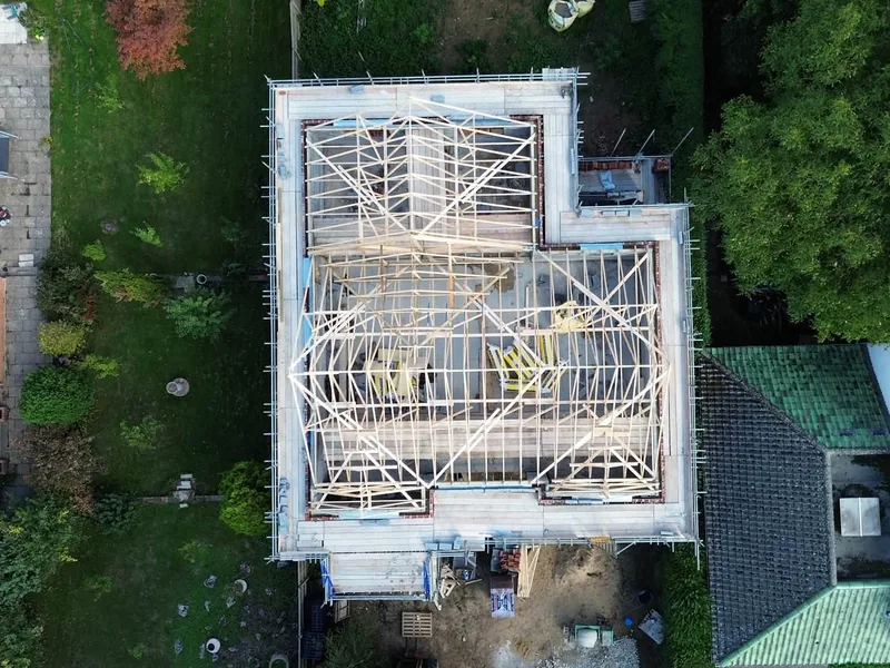 Overhead drone shot of the Boston roof structure and its valleys