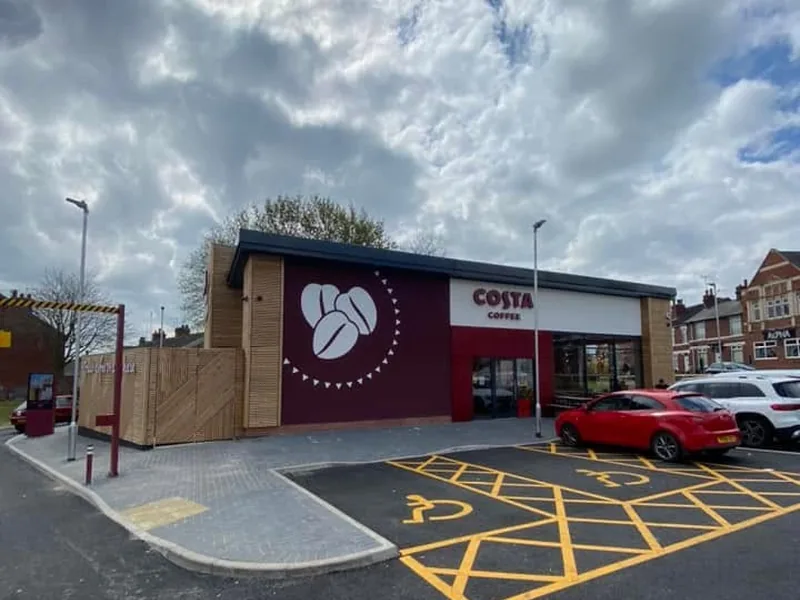 Completed Costa Coffee unit with timber cladding and new car park markings