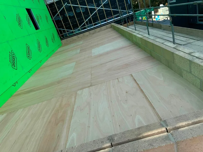 The Hinchingbrooke cycle store flat roof decked and ready for its covering