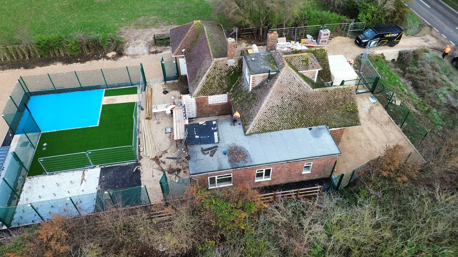 Aerial view of the Four Winds site during construction showing the bungalow and new ball court