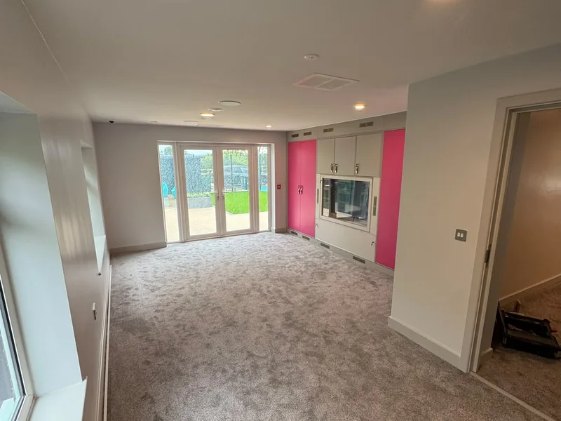 Completed open plan living area looking through to the garden