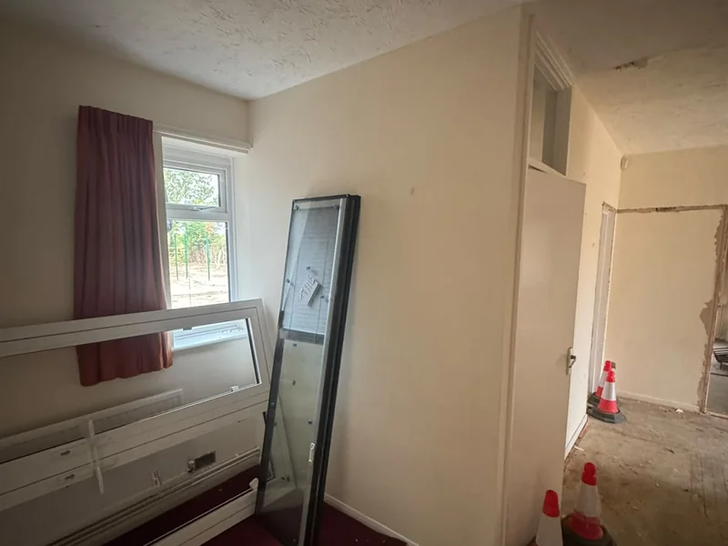 Bedroom stripped back ready for new layout and openings
