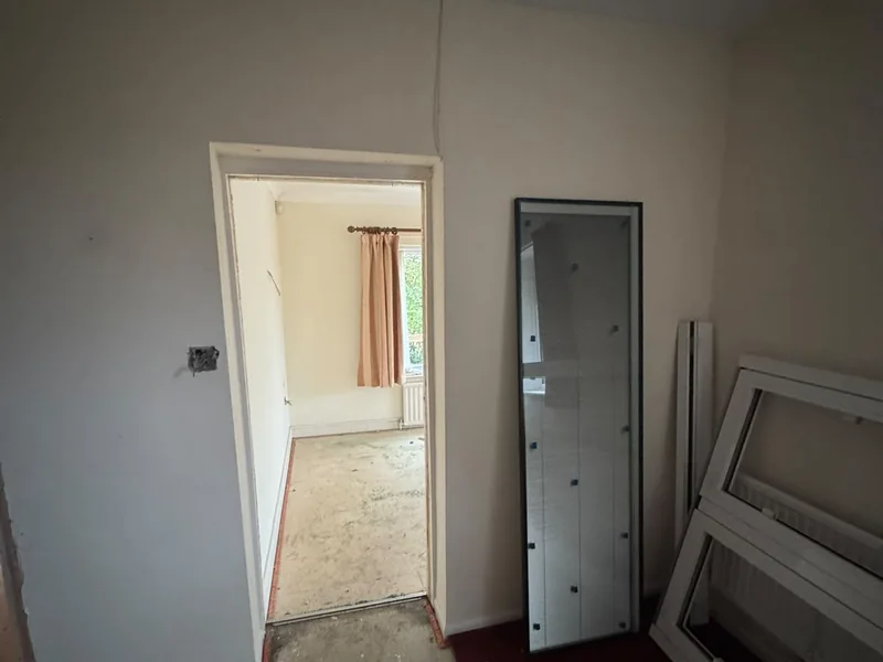 New internal door openings formed through the existing walls