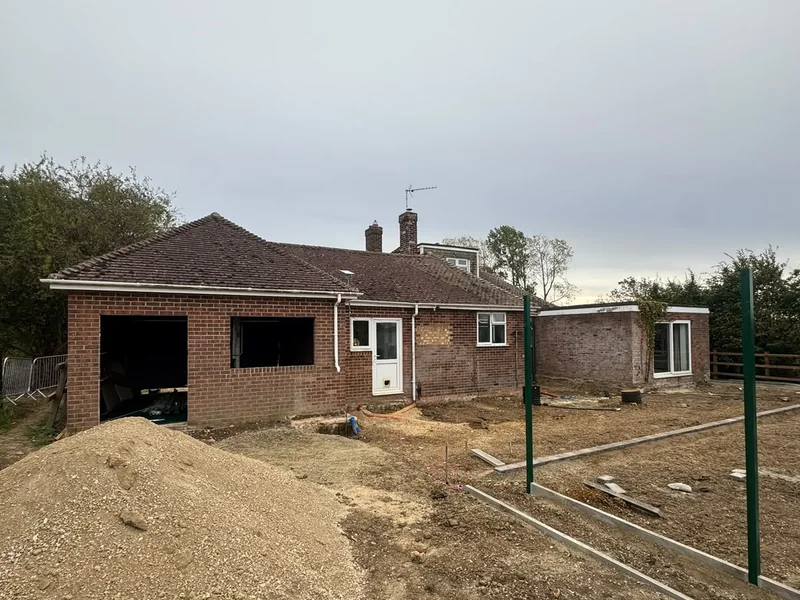Extension groundworks and steel fencing to the rear of the site