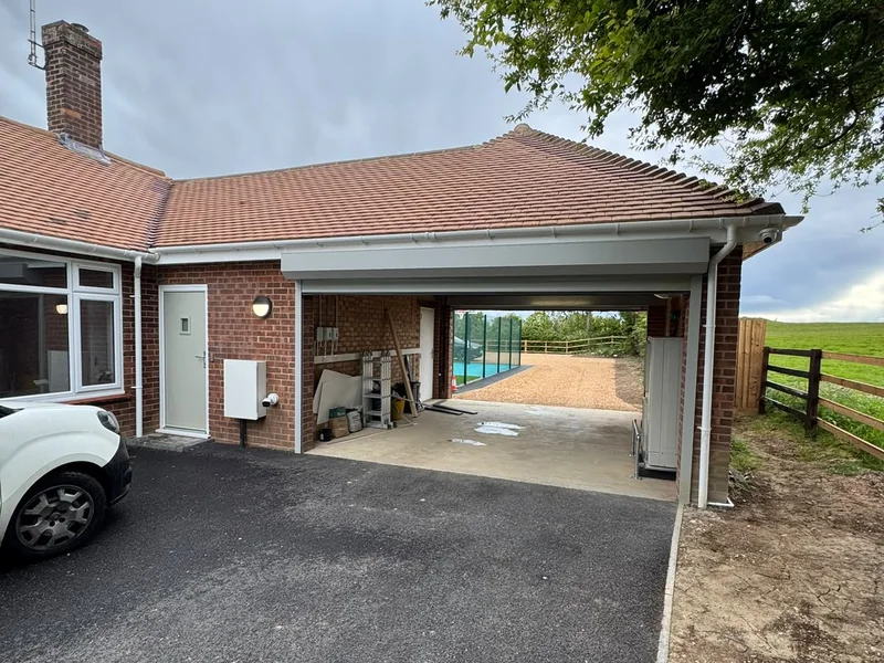 Completed carport and resin bound driveway at Ramsey facility