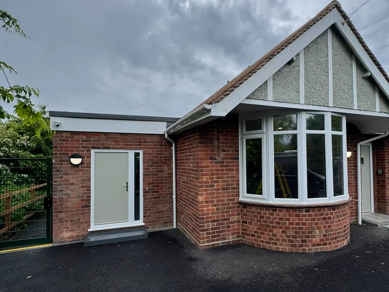 Completed front elevation with new feature gable glazing