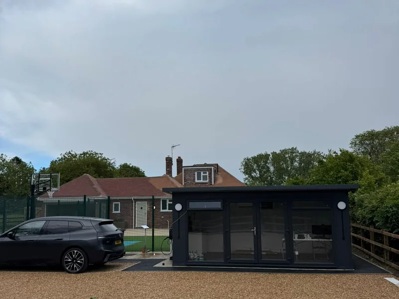 Rear view of the completed garden building and surfacing