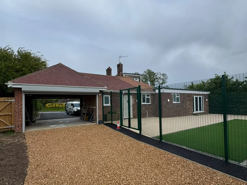New carport and gravel approach to the completed facility