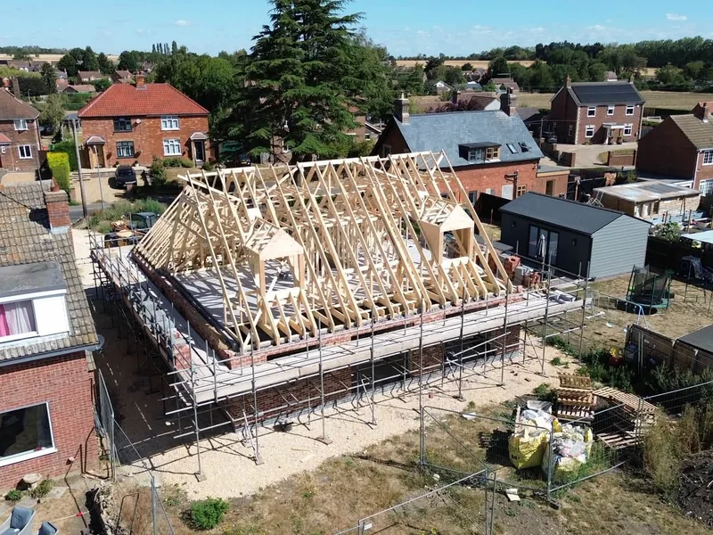 The Rippingale roof from above the village, with two dormer openings framed in the attic truss set