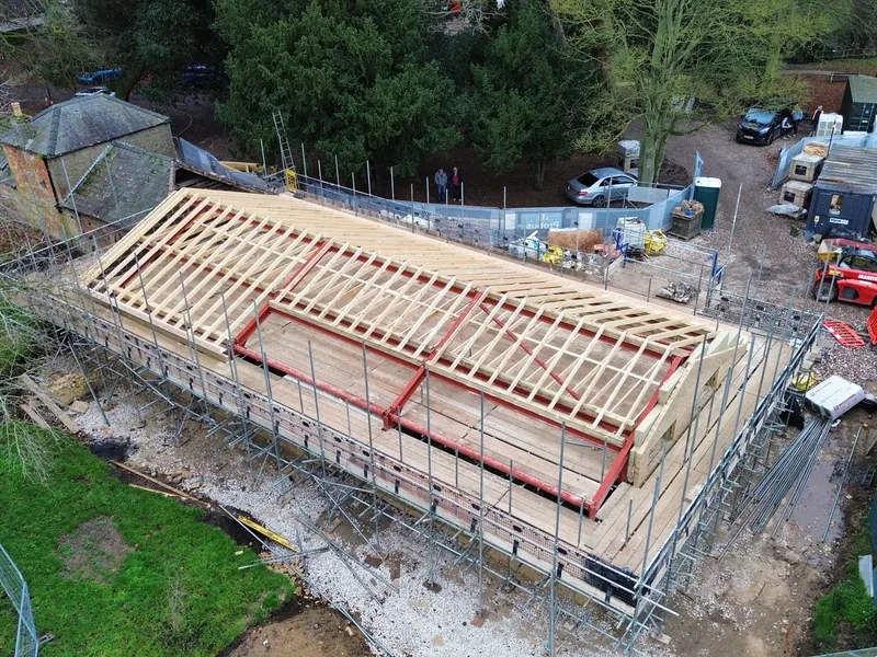 Hand cut roof structure with common rafters and valley sets