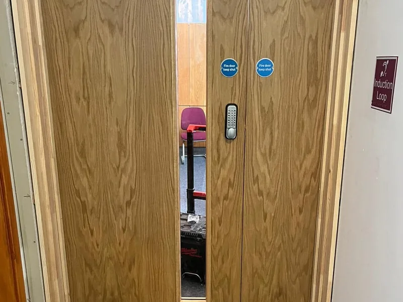 Fire door set being installed by AJB Group