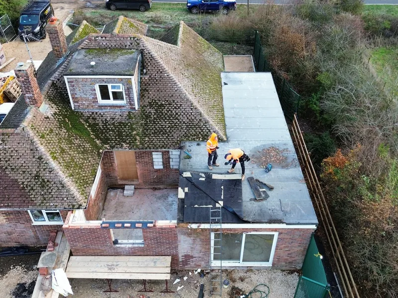 Flat roof deck being formed by AJB Group carpenters ahead of insulation and a GRP finish