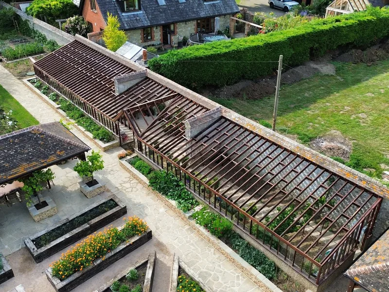 The 35 metre bespoke greenhouse built on site during a walled garden renovation