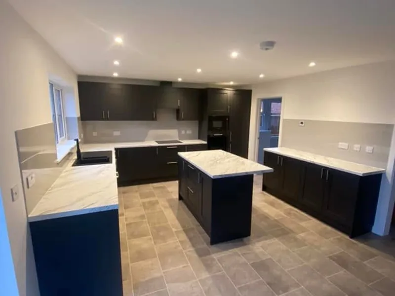 Completed kitchen with two islands fitted by AJB Group joiners