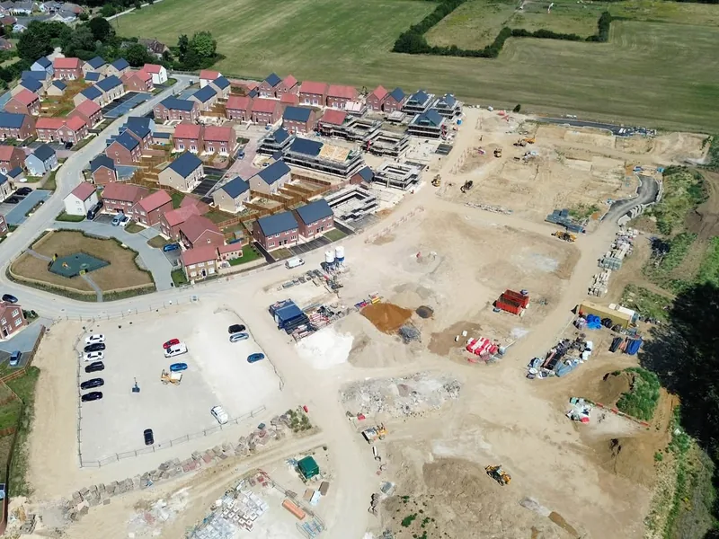 New build housing plots under construction with AJB Group carpentry in progress