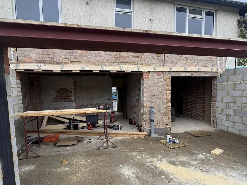 Roof structure alteration works under way on an existing building