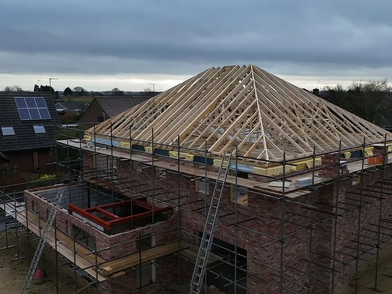 Roof trusses craned into position on a new build