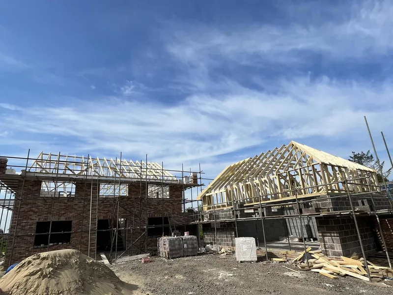 Cut roof structure with rafters and valleys built by AJB Group carpenters