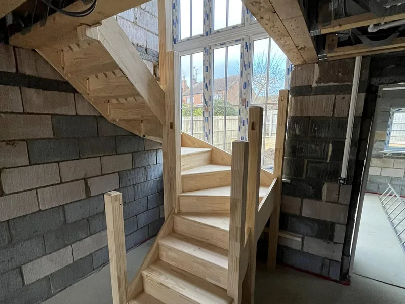Winder staircase flight built into a converted building